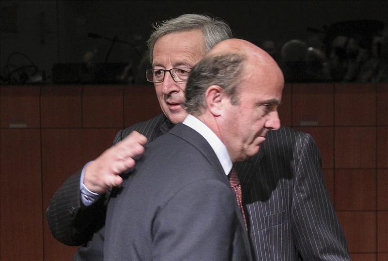 Juncker y De Guindos