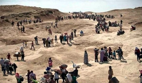 Imagen de los montes de Sinyar llenos yezidis huyendo de los yihadistas. / Bas News Agency