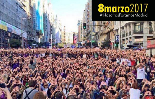Cartel de llamamiento a la marcha del 8M y al paro internacional con una imagen de la marcha del 7N contra las violencias machistas.